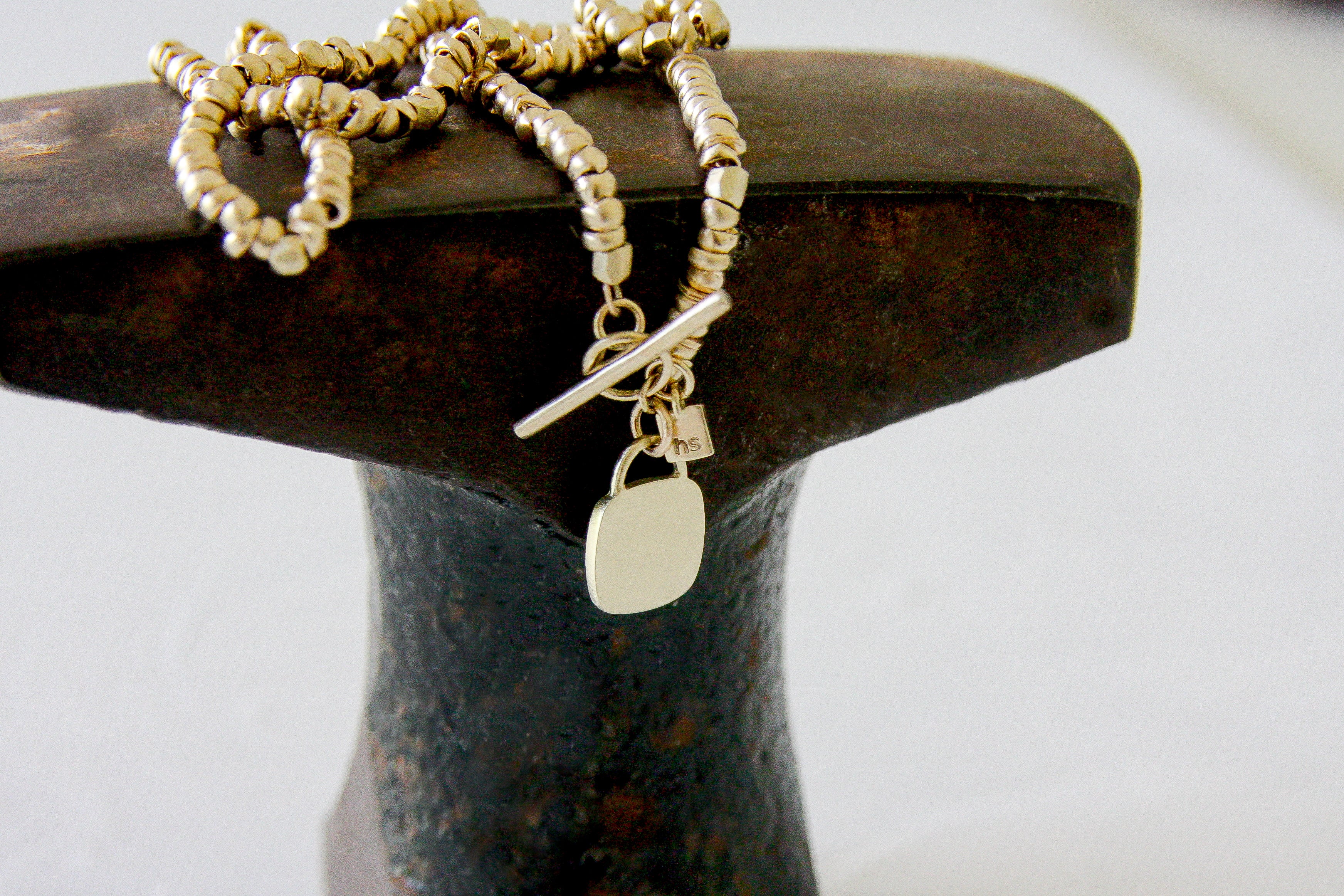 14K Solid Gold beads necklace with a gold & concrete charm