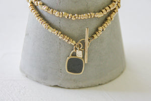 14K Solid Gold beads necklace with a gold & concrete charm