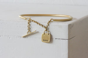 Solid Gold Open cuff bracelet with chain closure