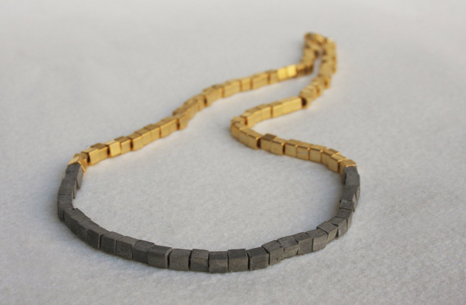 Tiny contemporary gold & concrete cubes necklace - hs